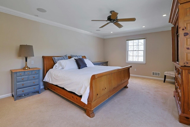 bedroom with crown molding, ceiling fan, and light carpet