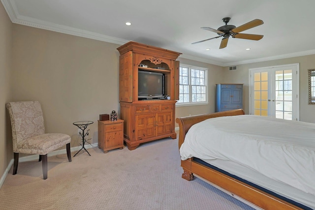 carpeted bedroom featuring crown molding, ceiling fan, and french doors