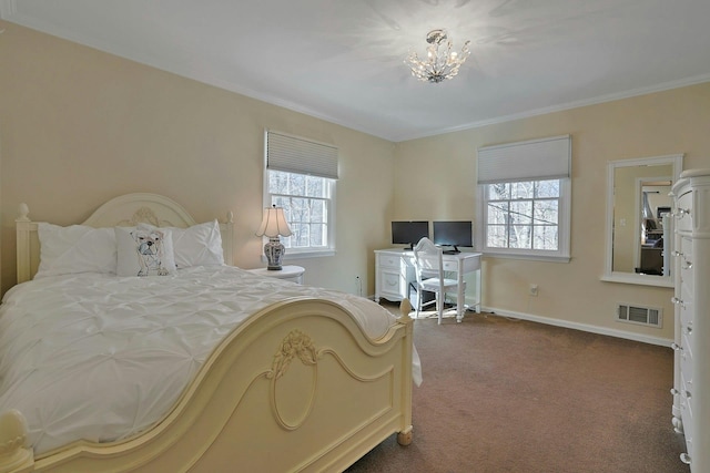 bedroom featuring ornamental molding, carpet, and a notable chandelier