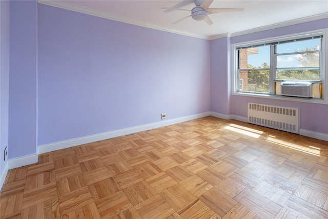 unfurnished room with radiator heating unit, cooling unit, light parquet floors, ornamental molding, and ceiling fan