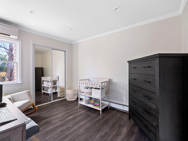 bedroom with a wall mounted air conditioner, dark hardwood / wood-style floors, a closet, and crown molding