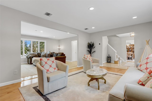 living room with light hardwood / wood-style floors