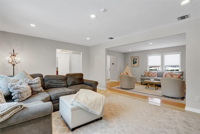 living room with light hardwood / wood-style flooring