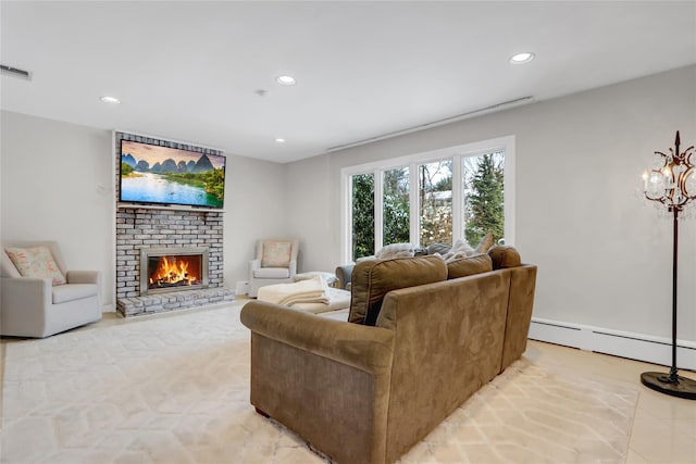 living room with a fireplace and baseboard heating