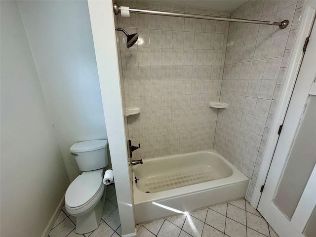 full bathroom with washtub / shower combination, baseboards, toilet, and tile patterned floors