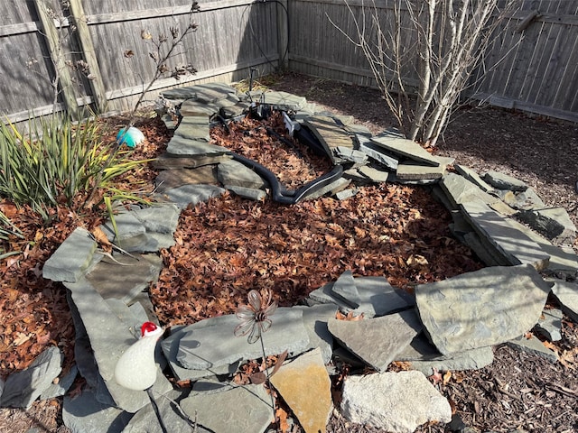 view of yard featuring fence