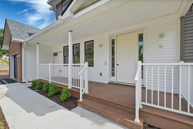 property entrance featuring covered porch