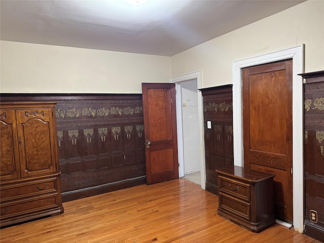 bedroom with light wood-type flooring