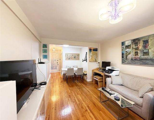 living room with light hardwood / wood-style floors