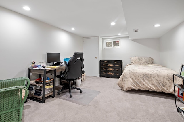 bedroom featuring light colored carpet