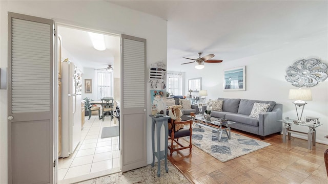 living room with ceiling fan