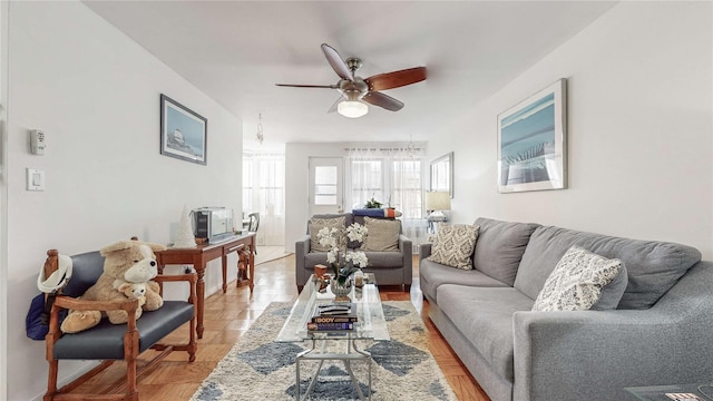 living room featuring ceiling fan