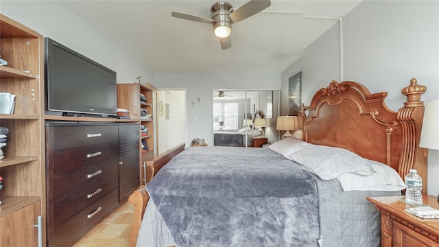 bedroom with ceiling fan and light wood-type flooring