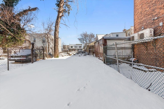 view of yard covered in snow