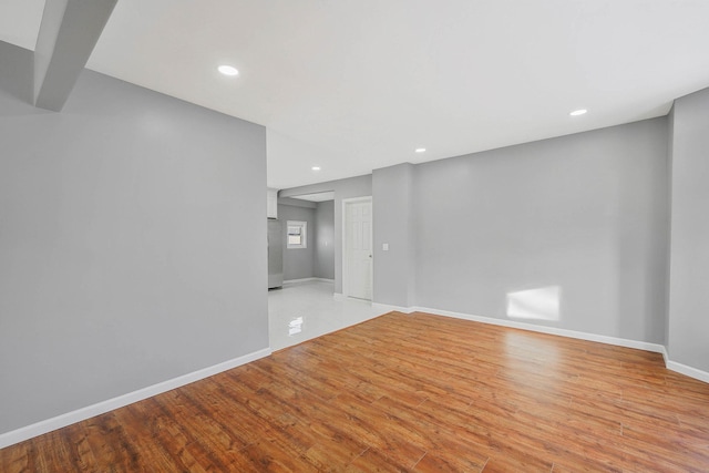 spare room featuring light hardwood / wood-style floors