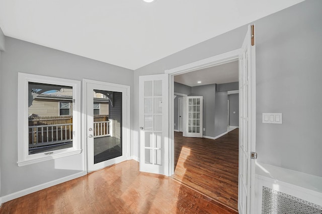 interior space featuring french doors and wood-type flooring