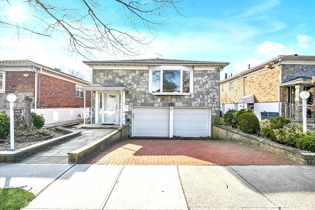 view of front of home with a garage