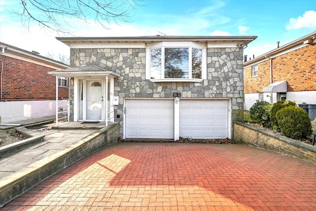 view of front of home featuring a garage