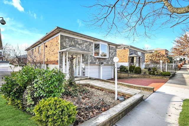 view of front of property featuring a garage