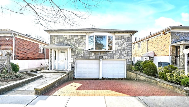 view of front of home featuring a garage