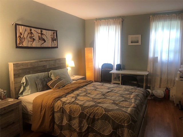 bedroom featuring dark hardwood / wood-style floors