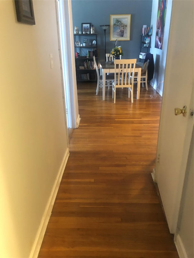 hall featuring hardwood / wood-style flooring