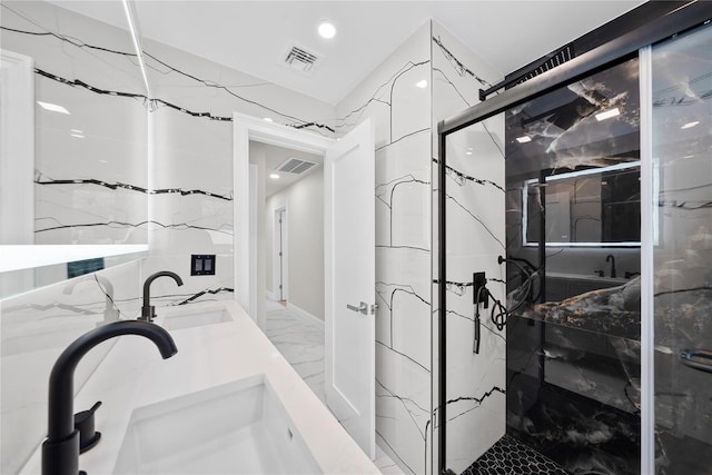 bathroom featuring vanity and walk in shower