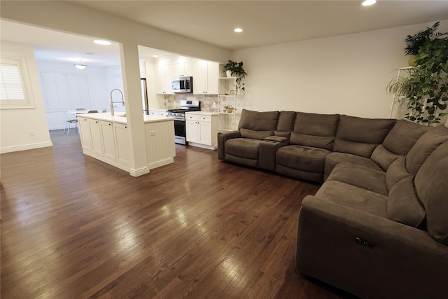 living room featuring dark wood-type flooring