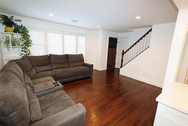 living room featuring dark hardwood / wood-style floors