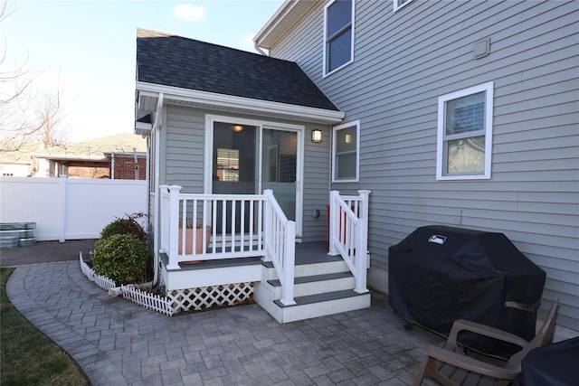 back of house with a patio