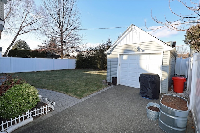 garage featuring a yard