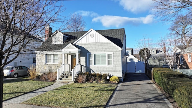 view of front of home with a front yard