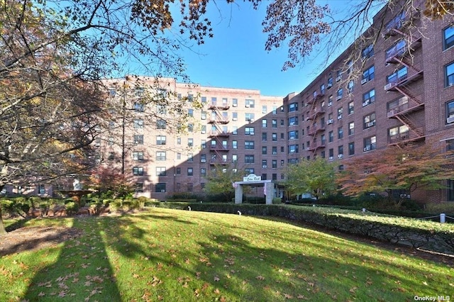 view of community featuring a yard