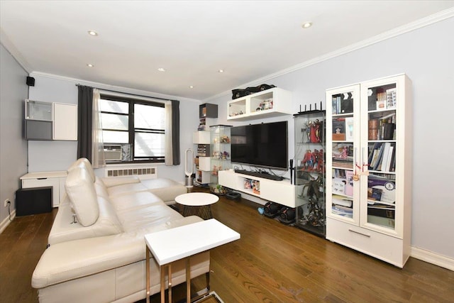 living room featuring ornamental molding, dark hardwood / wood-style floors, and radiator heating unit