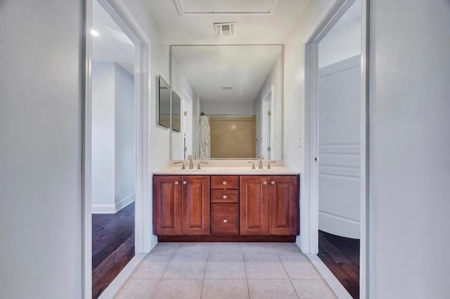 bathroom featuring vanity and tile patterned floors