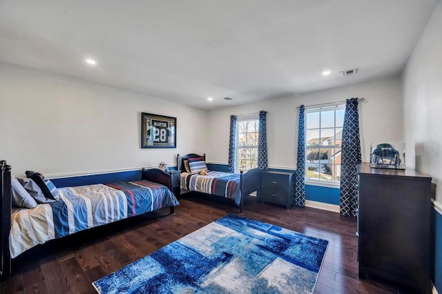 bedroom featuring dark wood-type flooring