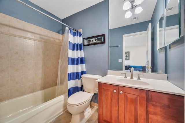 full bathroom with vanity, tile patterned floors, toilet, and shower / tub combo with curtain