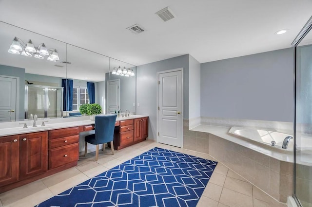 bathroom with vanity, separate shower and tub, and tile patterned floors