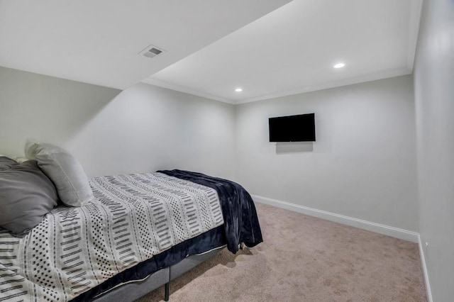 bedroom featuring light carpet and ornamental molding