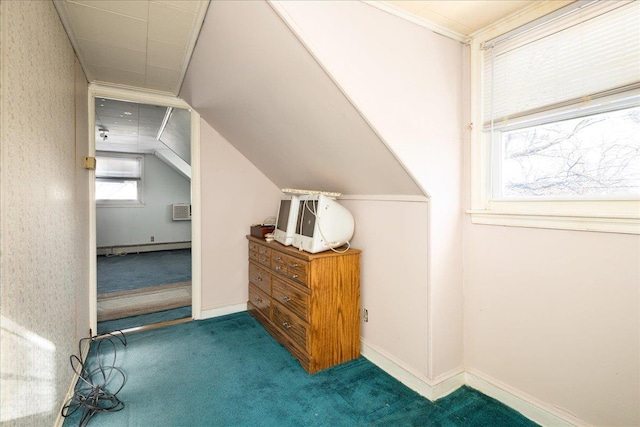 additional living space with lofted ceiling, a wall mounted air conditioner, and carpet