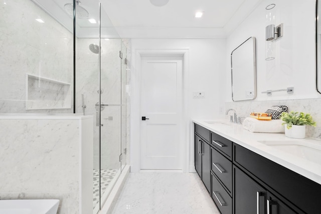 bathroom featuring walk in shower, ornamental molding, and vanity