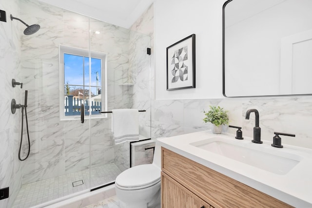 bathroom featuring vanity, decorative backsplash, tile walls, toilet, and walk in shower