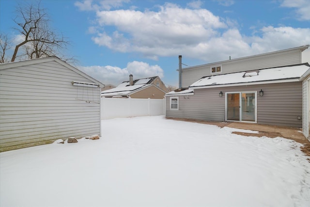 view of yard covered in snow