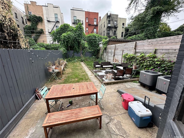 view of patio / terrace featuring central air condition unit