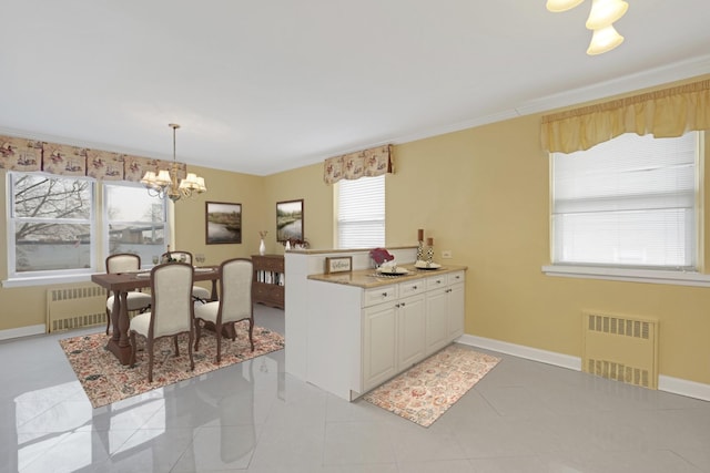 162-21 Powells Cove Blvd Unit 3D, Beechhurst, NY 11357 - kitchen with radiator, decorative light fixtures, light tile patterned floors, and a chandelier