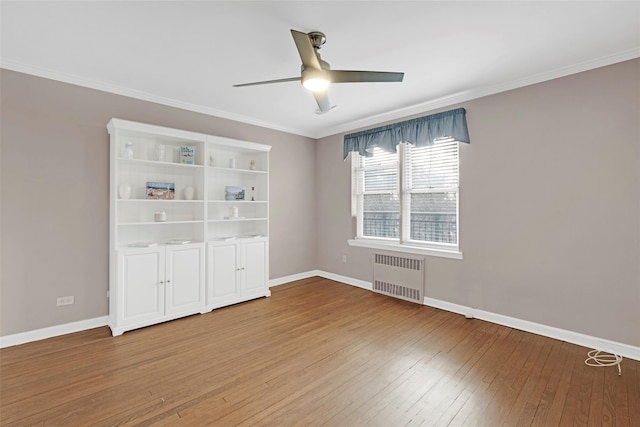 162-21 Powells Cove Blvd Unit 3D, Beechhurst, NY 11357 - unfurnished bedroom with ceiling fan, wood-type flooring, radiator, and ornamental molding