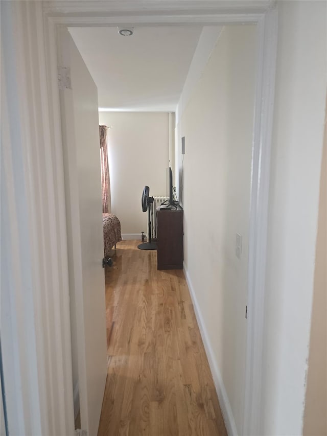 hallway featuring light hardwood / wood-style floors