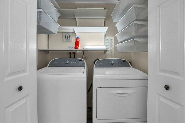 laundry area with washer and dryer