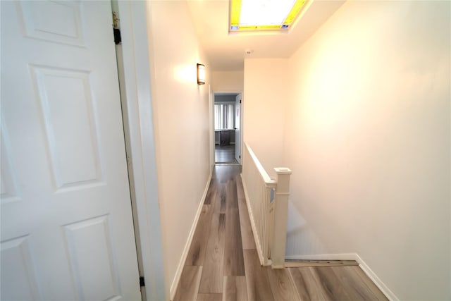 hallway featuring light hardwood / wood-style flooring