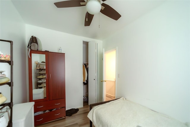 bedroom featuring ceiling fan and light wood-type flooring